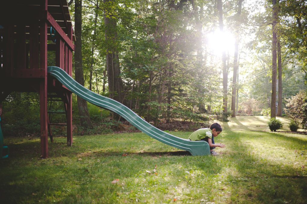 Little boy on swingset
