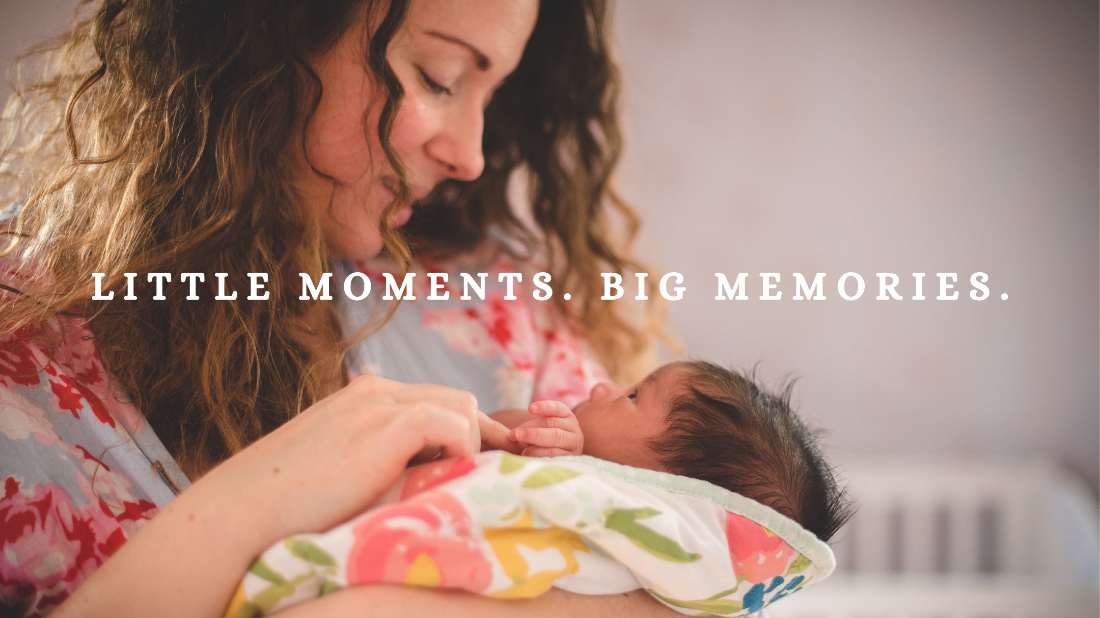 Mother lovingly looking at baby girl