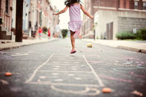 Little girl playing hopskotch in South Philadelphia 