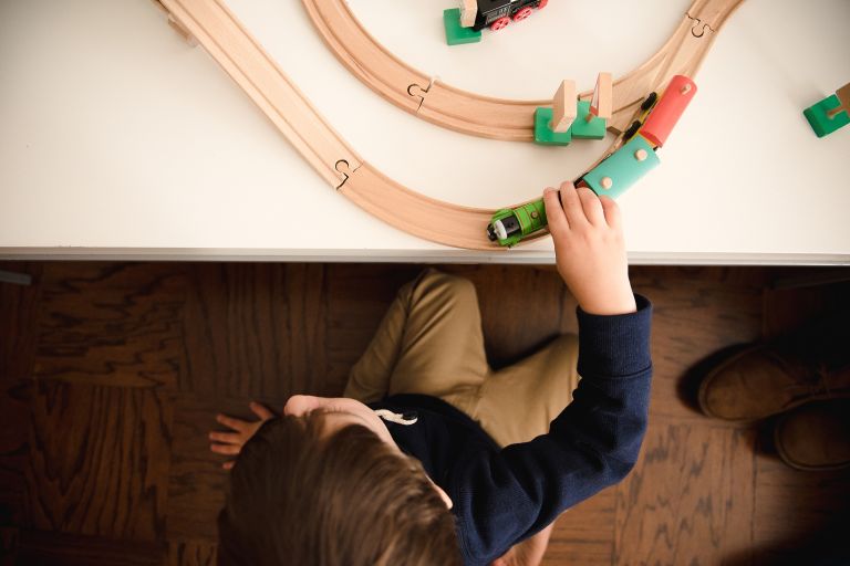 Child playing with trains