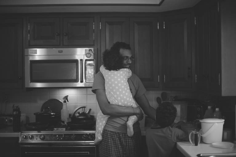 Dad with kids in the kitchen