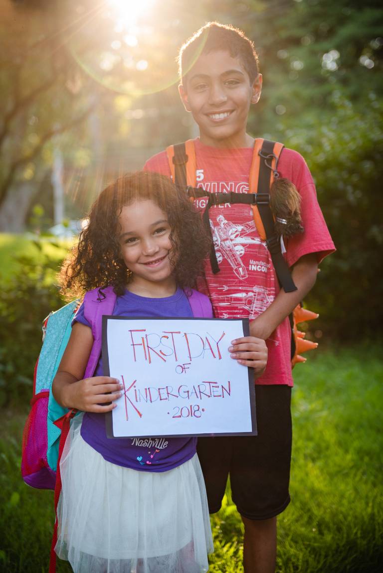 Sister and brother on first day of kindergarten