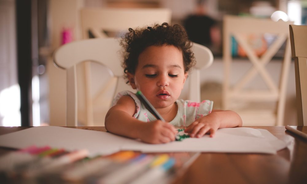 little girl coloring