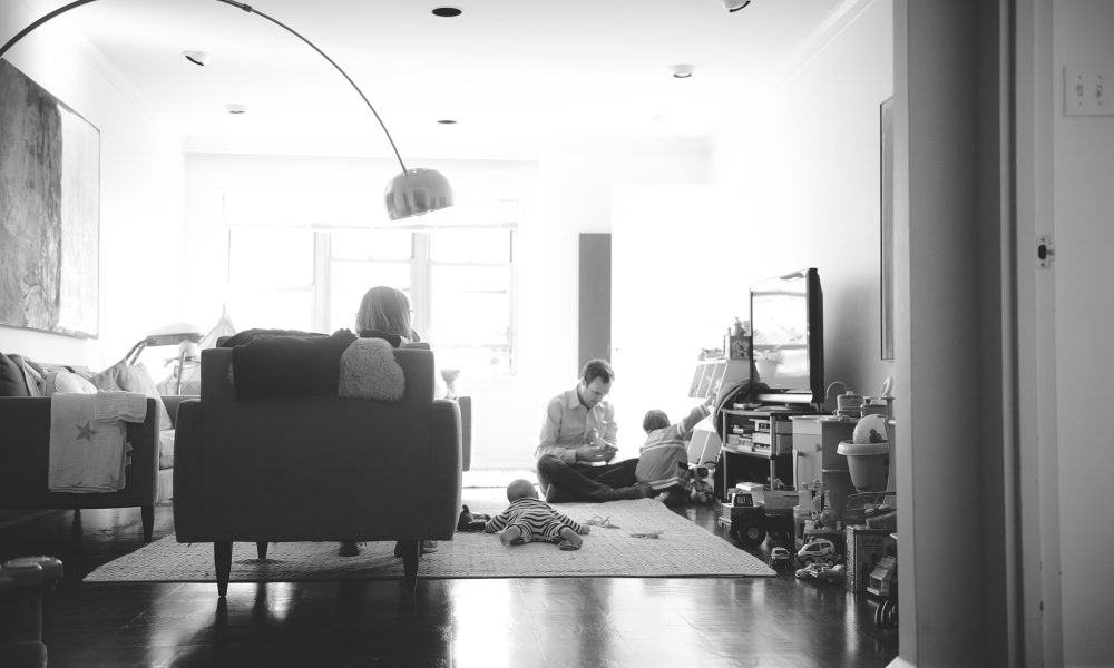 Life at home - family playing on the floor