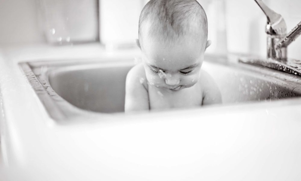 5 month old in sink
